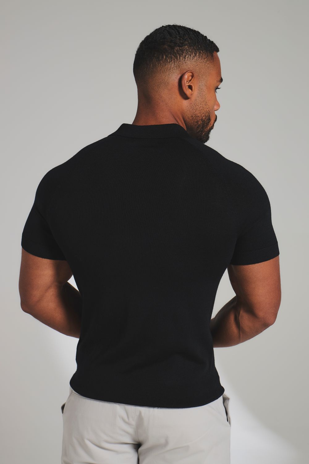 Extra Fine Merino Wool Knitted Open Collar Polo Shirt in Black