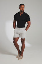 Extra Fine Merino Wool Knitted Open Collar Polo Shirt in Black